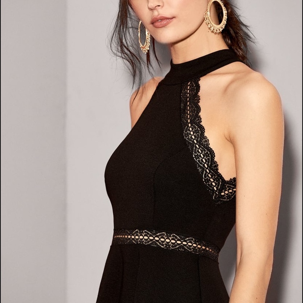 Lulu’s gorgeous black mini dress with beautiful trim. So cute and flatte…